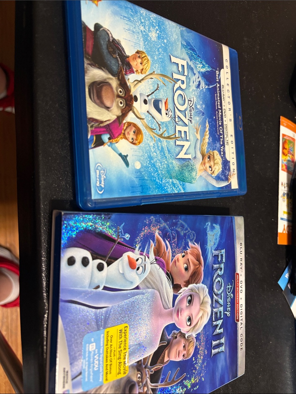 Frozen and Frozen II Disney DVDs.